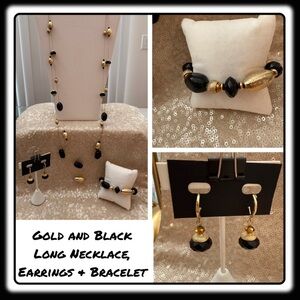 Set of gold & black necklace, dangle earrings and stretchy bracelet